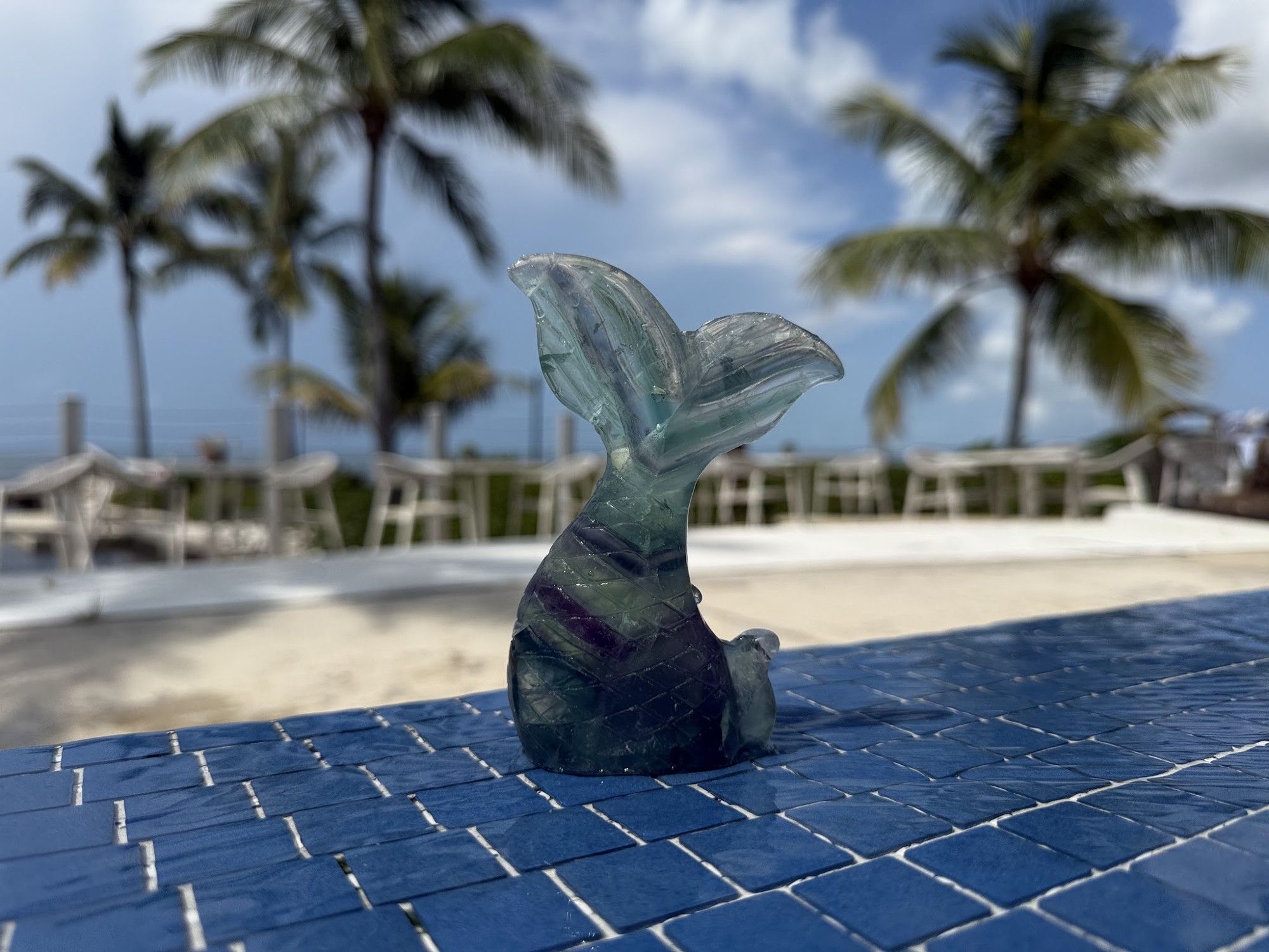 Hand-carved obsidian mermaid gemstone