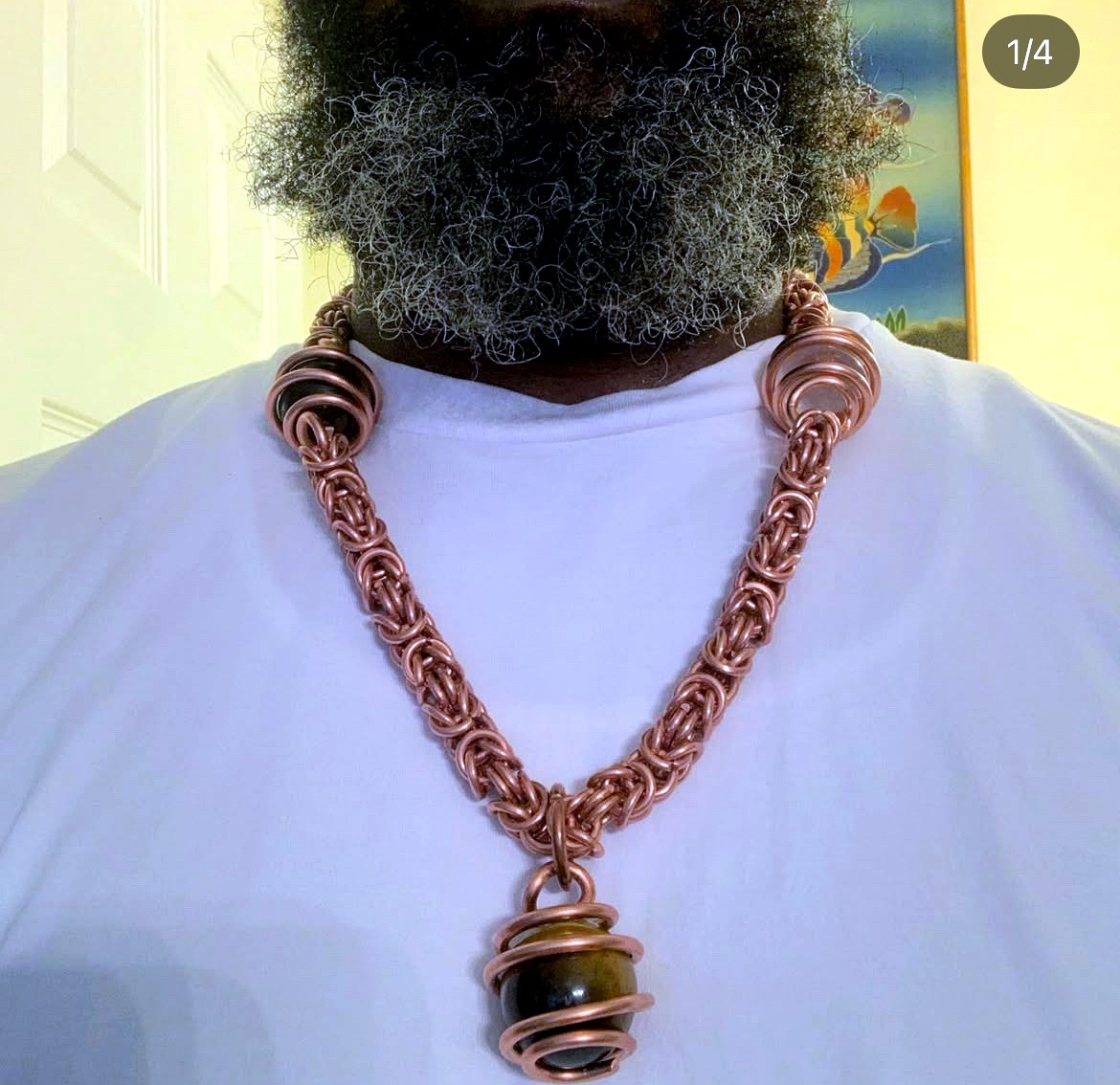 Heavy Byzantine-link copper chain with tiger's-eye caged pendant